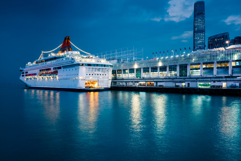 Contemporary cruises on a modern cruise ship at port at night