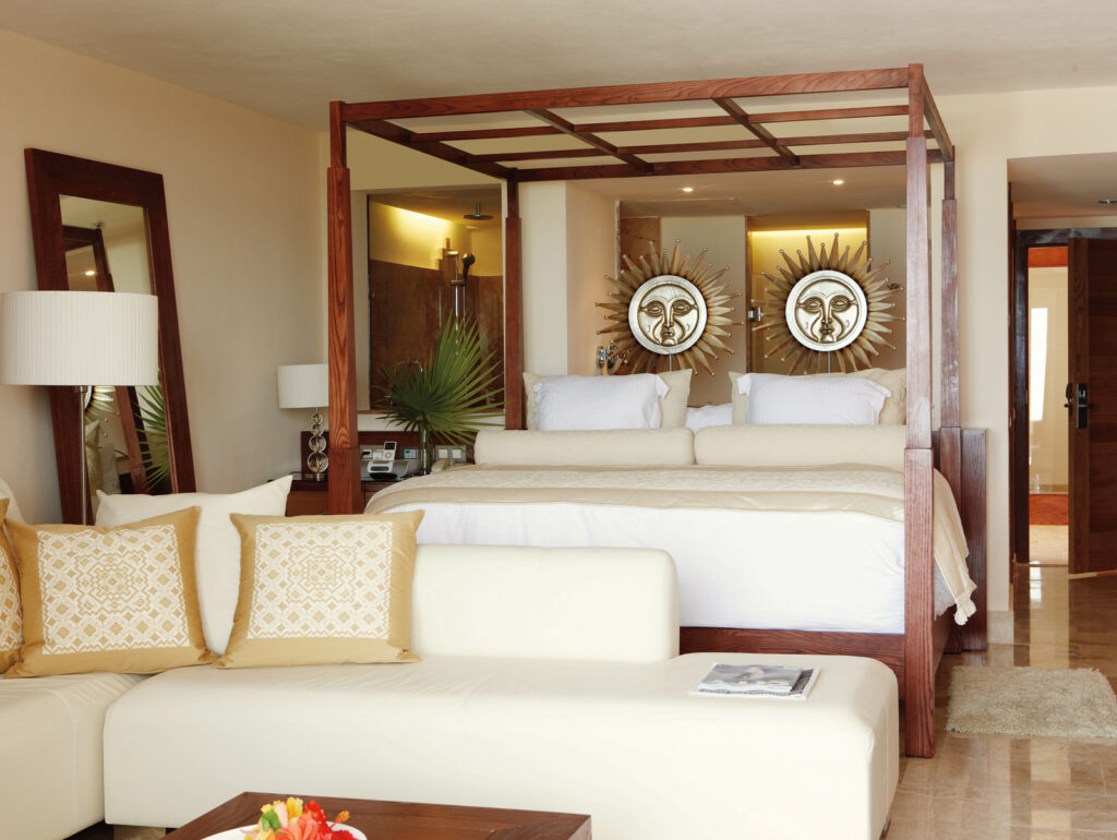 Luxury all inclusive resorts suite with canopy bed